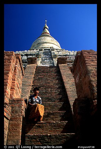 On steps of Shwesandaw Paya's upper terraces. Bagan, Myanmar