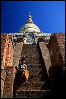 On steps of Shwesandaw Paya's upper terraces. Bagan, Myanmar (color)