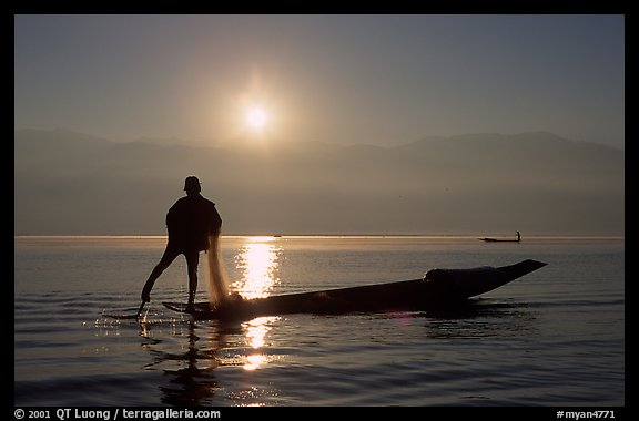 Intha fisherman, sunrise. Inle Lake, Myanmar (color)