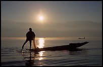 Intha fisherman, sunrise. Inle Lake, Myanmar