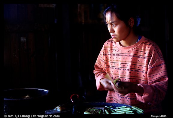 Woman Making cheerots. Inle Lake, Myanmar