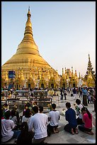 Praying from the Victory Ground, Shwedagon Pagoda, late afternoon. Yangon, Myanmar