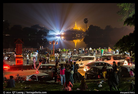 Shores of Kandawgyi with revelers on 2014 New Year night. Yangon, Myanmar (color)