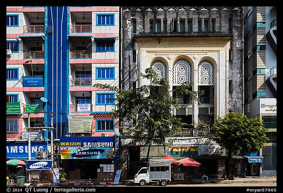 Modern and colonial-area facades in city center. Yangon, Myanmar (color)