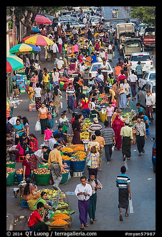 Street crowd from above with fruit and vegetable sellers. Yangon, Myanmar (color)