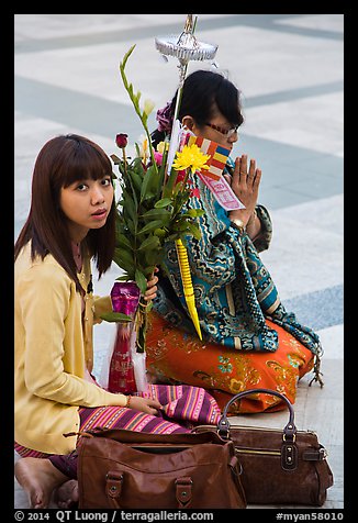 Women in prayer, Shwedagon Pagoda. Yangon, Myanmar