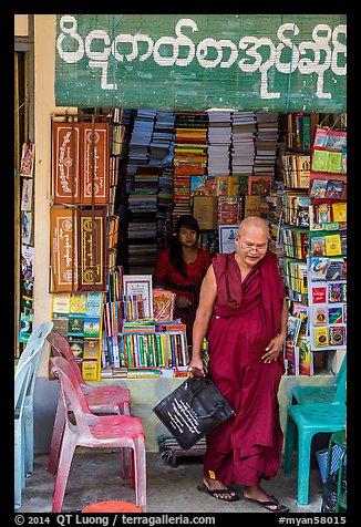 Monk leaves bookstore, Shwedagon Pagoda. Yangon, Myanmar (color)