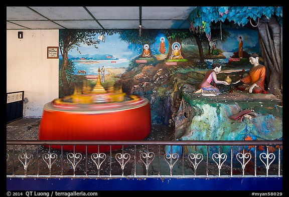 Scene of the life of lord Buddha and spinning pagoda model, Botataung Pagoda. Yangon, Myanmar (color)