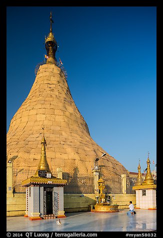 Man praying outside Botataung Pagoda main stupa. Yangon, Myanmar (color)