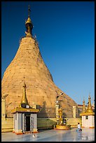 Man praying outside Botataung Pagoda main stupa. Yangon, Myanmar ( color)