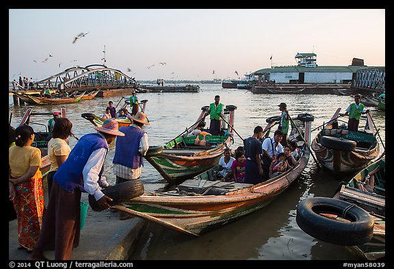 Passengers on oared water taxi crossing Yangon River. Yangon, Myanmar (color)