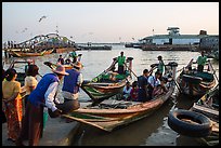 Passengers on oared water taxi crossing Yangon River. Yangon, Myanmar ( color)