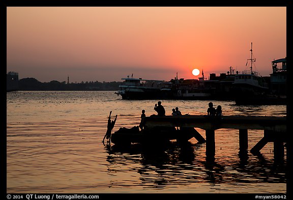 Diving into the Yangon River at sunset. Yangon, Myanmar (color)