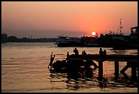 Diving into the Yangon River at sunset. Yangon, Myanmar ( color)