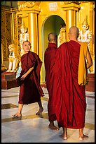 Monks on platform, Shwedagon Pagoda. Yangon, Myanmar