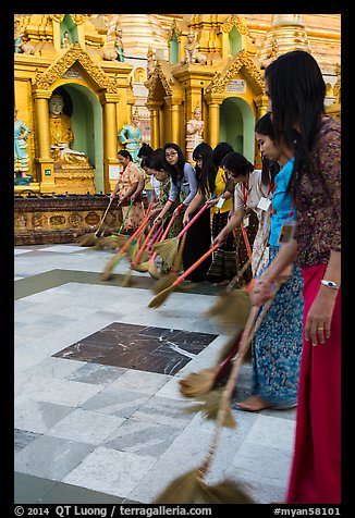 Women sweeping platform, Shwedagon Pagoda. Yangon, Myanmar (color)
