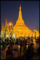 Golden dome seen from the Victory Ground at dusk, Shwedagon Pagoda. Yangon, Myanmar