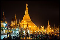 Praying from the Victory Ground, Shwedagon Pagoda, night. Yangon, Myanmar ( color)