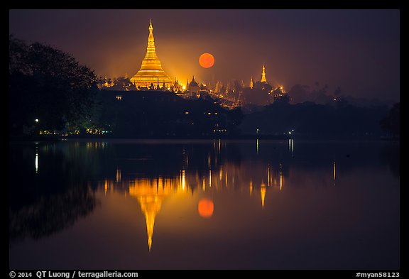 Moonset over Shwedagon Pagoda and Kandawgyi Lake. Yangon, Myanmar (color)