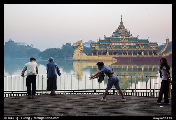 People exercising in front of Karawiek Hall. Yangon, Myanmar (color)