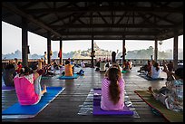 Women exercising in pavillion on Kandawgyi lake near Karawiek Hall. Yangon, Myanmar ( color)