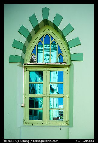 Church tower reflected in window. Yangon, Myanmar (color)