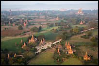 Aerial view of many temples set amongst fields. Bagan, Myanmar