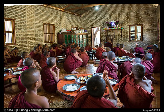 Novices in prayer before lunch, Nyaung U. Bagan, Myanmar (color)