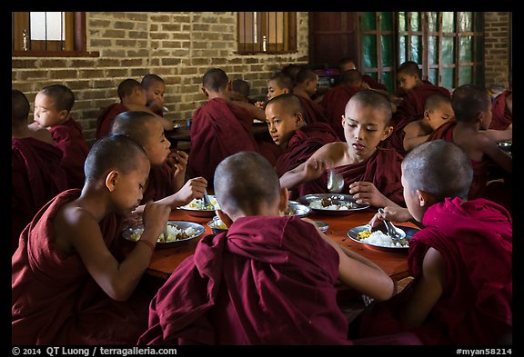 Novices eat lunch, last meal of the day. Bagan, Myanmar (color)