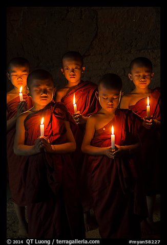 Group of buddhist novices holding candles. Bagan, Myanmar (color)