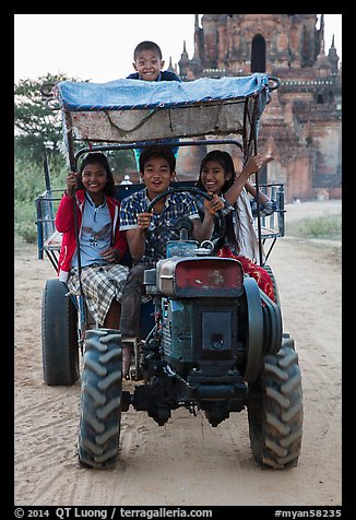 Children driving tractor, Minnanthu village. Bagan, Myanmar (color)