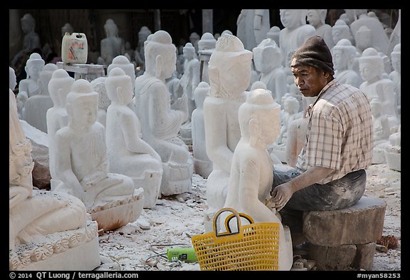 Worshop producing buddha statues on Marble street. Mandalay, Myanmar (color)