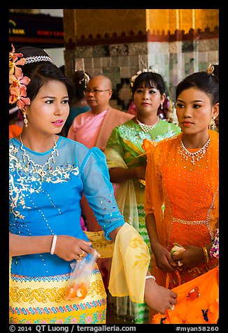 Women wearing their best dress for Shinbyu ceremony, Mahamuni Pagoda. Mandalay, Myanmar (color)