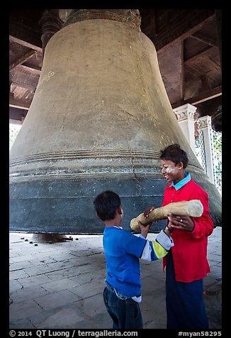 Children ring the huge Mingun bell, Mingun. Myanmar (color)