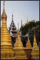 Stupas and spires at dawn, Sutaungpyei Pagoda. Mandalay, Myanmar ( color)