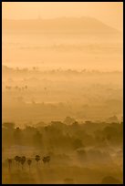 Ridges in mist at sunrise seen from Mandalay Hill. Mandalay, Myanmar ( color)