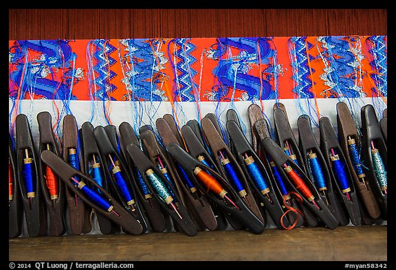 Close-up of loom in weaving workshop. Amarapura, Myanmar (color)