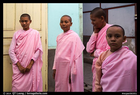 Nuns and pastel walls, Zayar Theingi Nunnery, Sagaing. Myanmar (color)