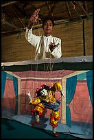 Puppeter handling traditional burmese string marionette. Mandalay, Myanmar ( color)