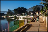 Woman biking near Pone Tanoke Lake. Pindaya, Myanmar ( color)