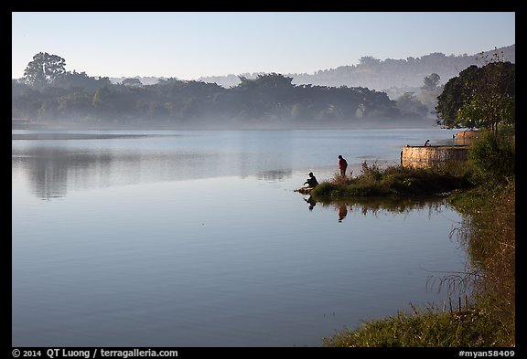 Men on shore of Pone Tanoke Lake. Pindaya, Myanmar (color)