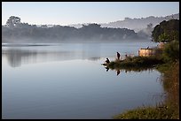 Men on shore of Pone Tanoke Lake. Pindaya, Myanmar ( color)