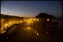 Cottages on stilts at dawn, Myanmar Treasure Resort. Inle Lake, Myanmar ( color)