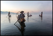 Group of Intha fishermen at dawn with surface mist. Inle Lake, Myanmar ( color)
