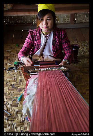 Young padaung woman weaving. Inle Lake, Myanmar (color)