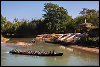 Villagers navigating canal in narrow boat, Indein. Inle Lake, Myanmar ( color)