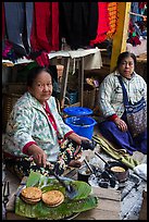 Woman cooking burmese pancakes at market. Inle Lake, Myanmar ( color)