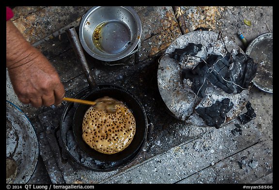 Pancackes cooked on coals. Inle Lake, Myanmar (color)