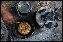 Pancackes cooked on coals. Inle Lake, Myanmar ( color)