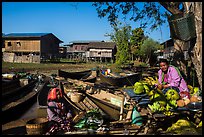 Market, boats, and village houses on stilts. Inle Lake, Myanmar ( color)